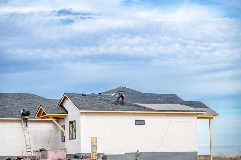 Local Asphalt Roof Installation pros at work